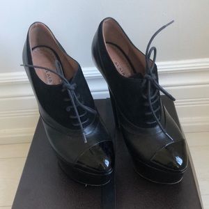 Alaia patent leather lace up ankle bootie